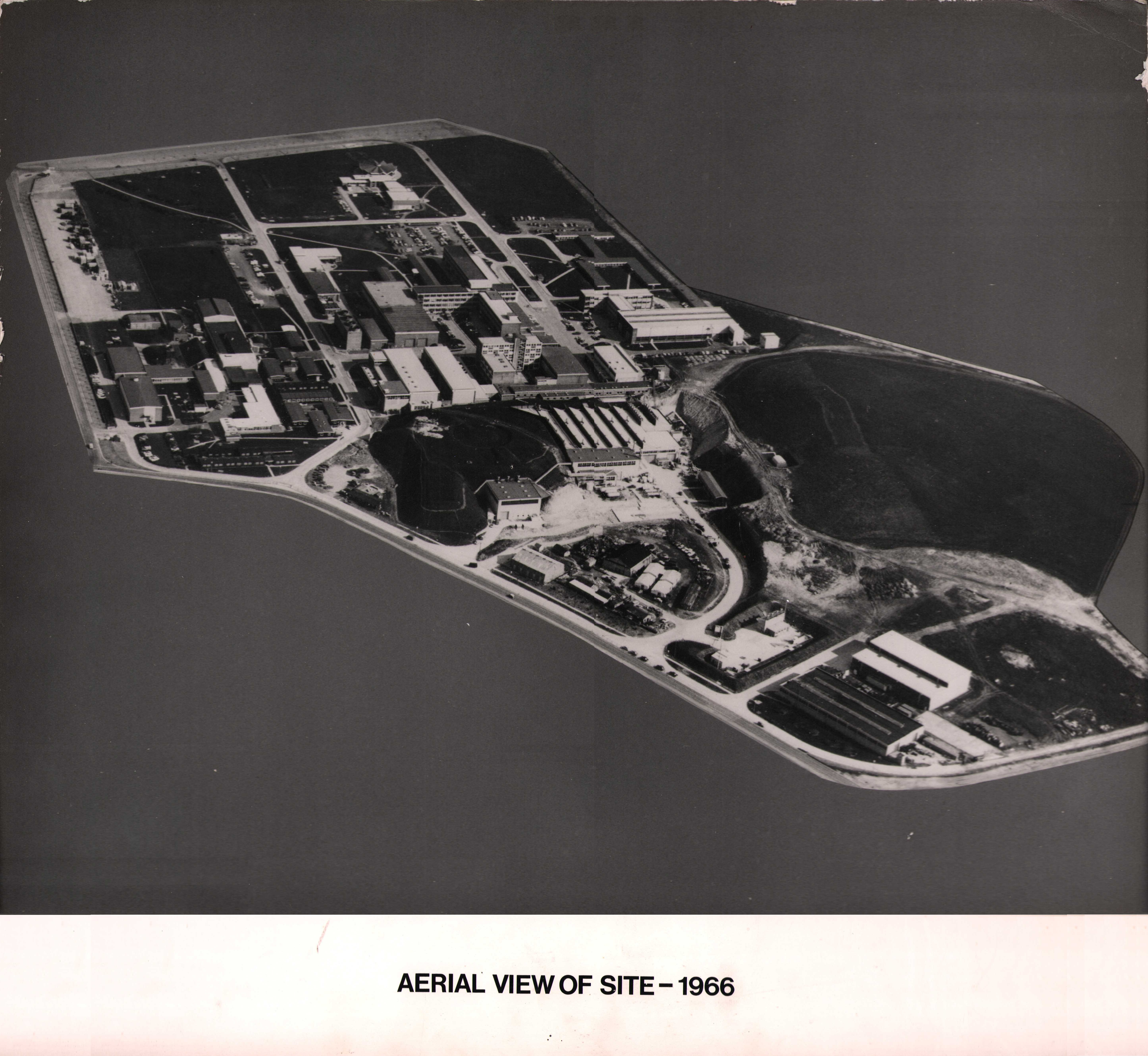 Aerial view of Rutherford Laboratory looking east; the "floating island" effect is most odd (1966)