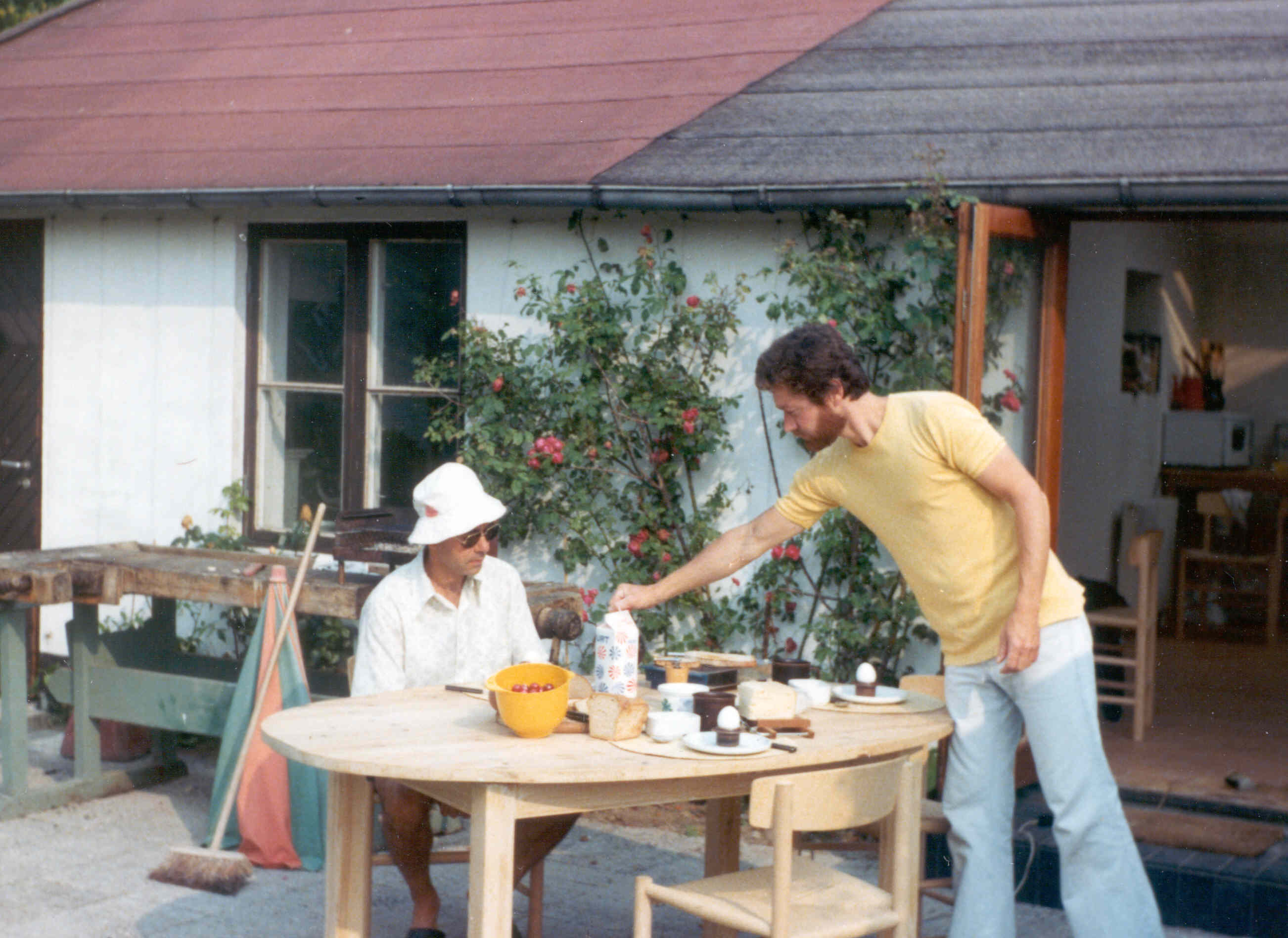 Richard Guedj and Hugh Tucker breakfast on local cherries and eggs before editing, 27 July 1978