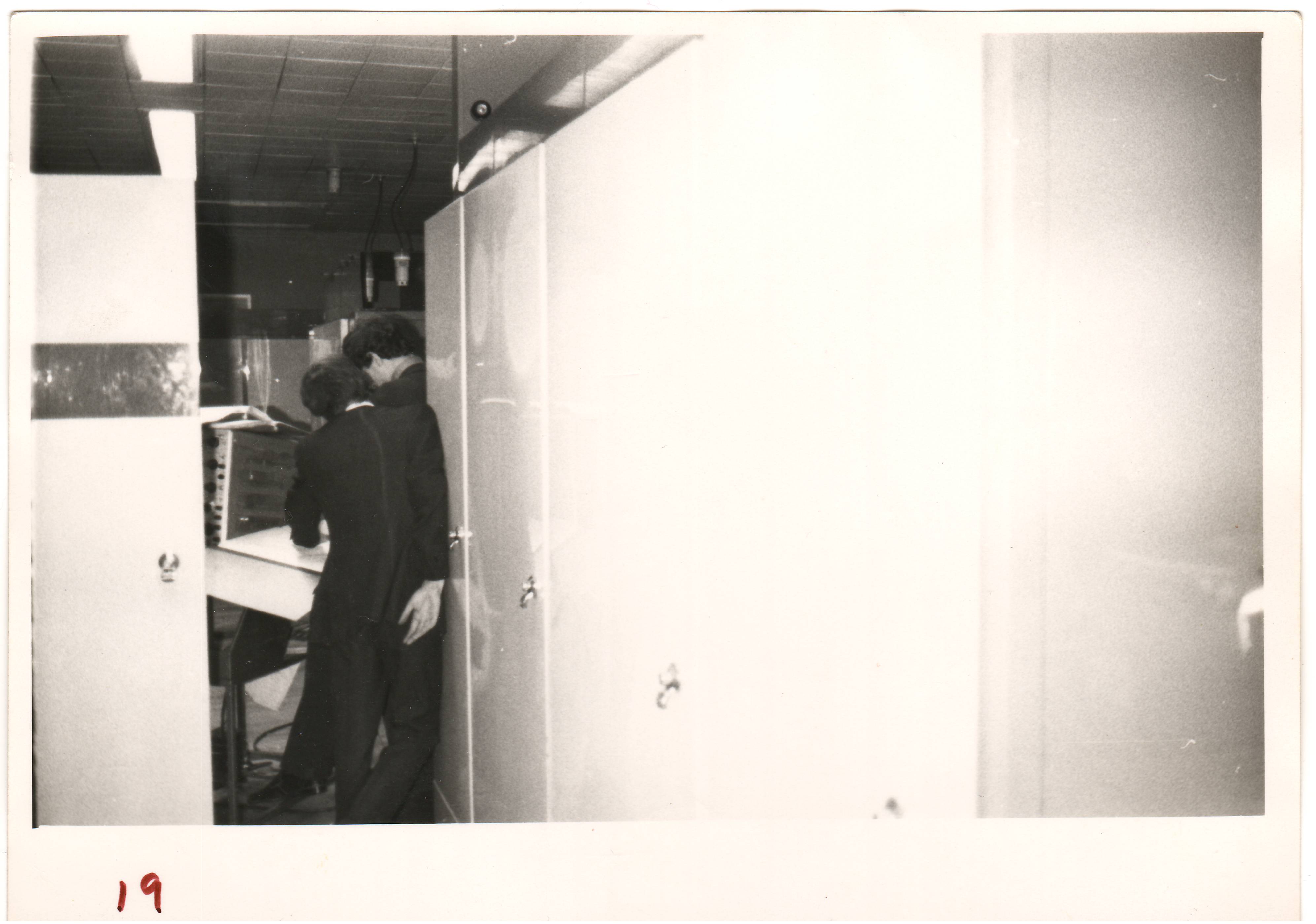 An Oscilloscope and it's trolley (see http://www.cs.man.ac.uk/CCS/res/res49.htm#g) in amongst the processor cabinets in the basement.