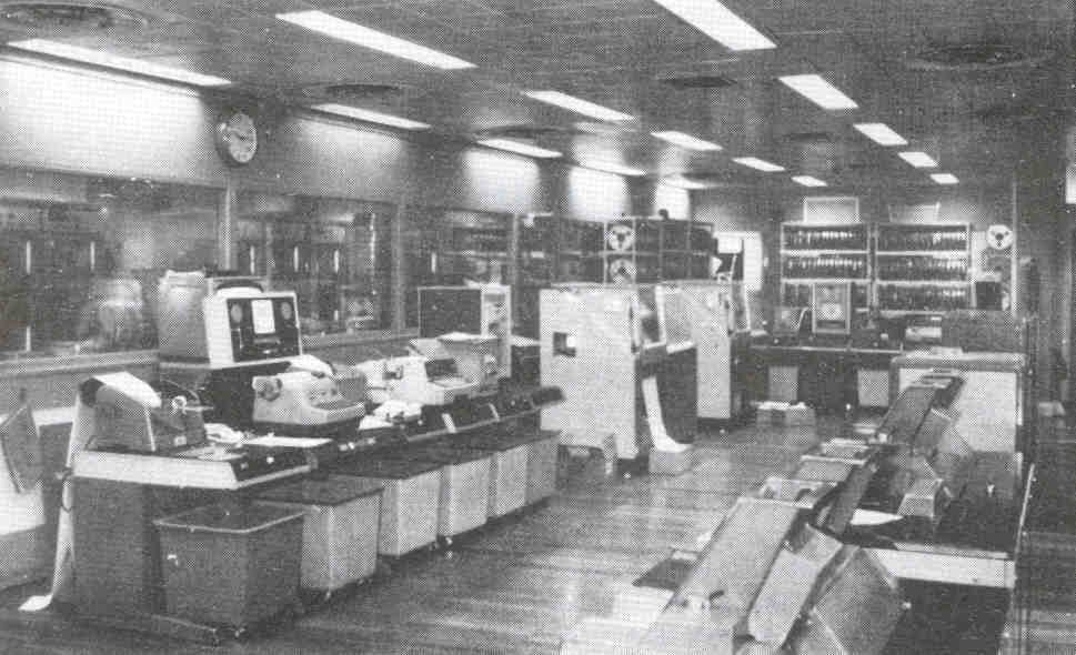 Fig 1: This photograph shows the main upstairs computer room where the actual work was done. 
The spiral staircase described by the author was in the adjoining left-hand small room 