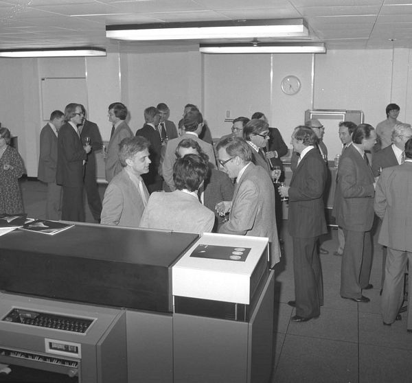 Cocktails, Bob Hopgood with ICL staff, top left