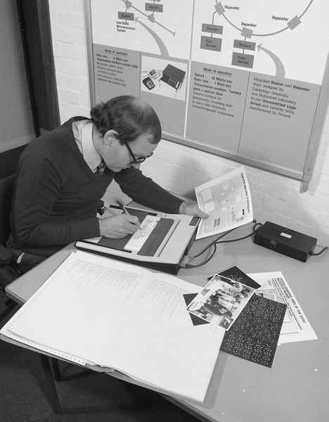 Fig 5.4 Using a micropad to maintain a computer-generated catalogue of photographic negatives.