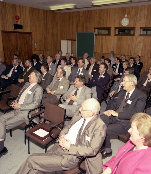 Some of the invited guests seem to be enjoying a joke