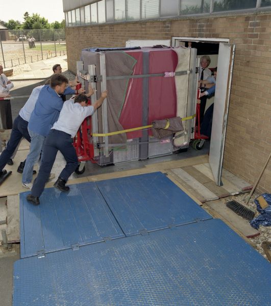 Fig 5.1a Delivery and installation of the new Cray Y-MP81 at the Atlas Centre.
