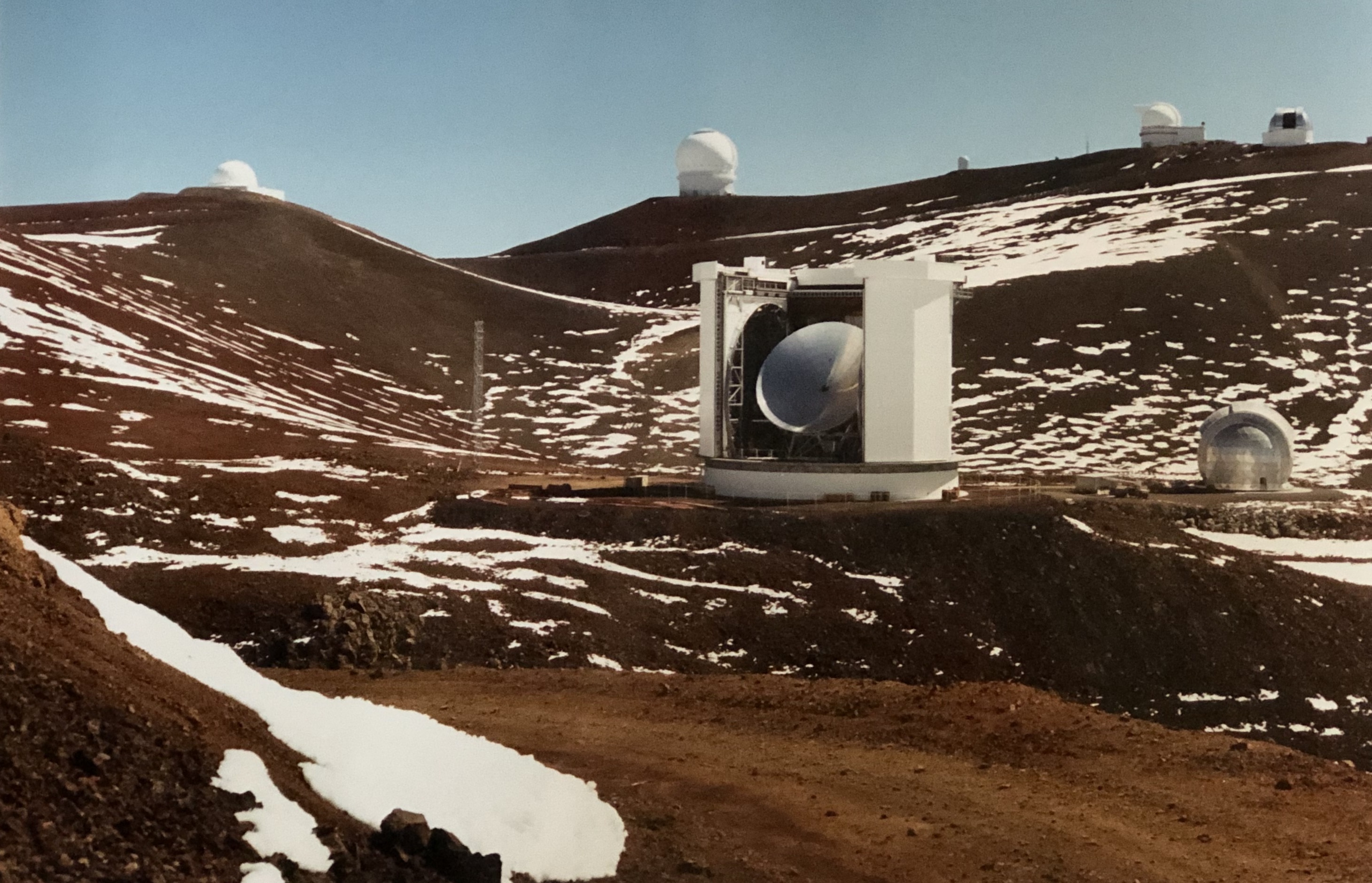Malcolm Currie, the technical consultant for this display, worked for some years in the Scientific Computing Group at the JAC.  He says that the occasional nights at the telescope was always a thrill, seeing new data as it arrived, and at the end driving across the lunar landscape you could sometimes see the red glow from Kilauea volcano... when there wasn't a sea of cloud beneath you.